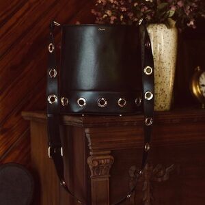 Cleobella Rochelle Handbag - Chic Black Bucket Bag with Gold Accents